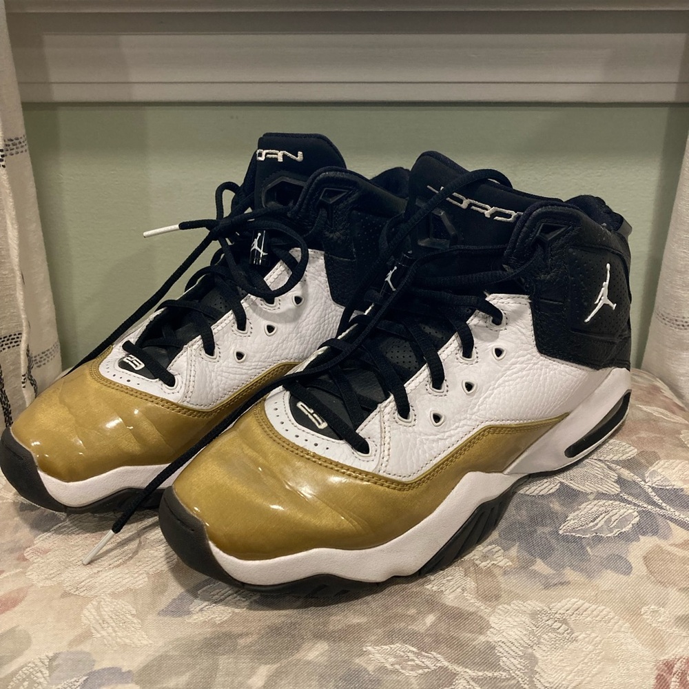 Gold and Black Nike Jordan’s